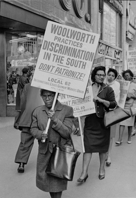 African American woman picketing Woolworth's discrimination in the south